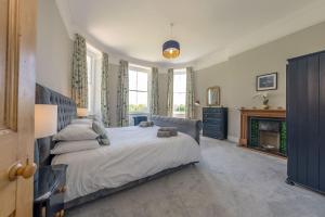 Postel nebo postele na pokoji v ubytování 2-Tyn-Caeau