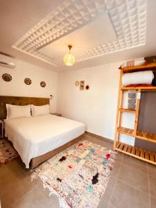 Postel nebo postele na pokoji v ubytování Riad Eglantine