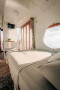 Postel nebo postele na pokoji v ubytování Bleibe- Quédate!