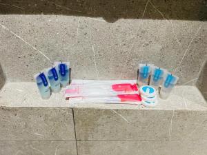 a group of toothbrushes sitting on a counter at رغدان فيو للشقق المخدومة in Al Baha +23 photos