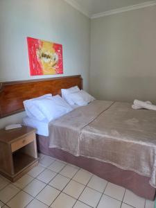 Ένα ή περισσότερα κρεβάτια σε δωμάτιο στο Flat Ceaser Towers a Beira Mar +17 φωτογραφίες