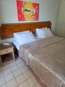 Ένα ή περισσότερα κρεβάτια σε δωμάτιο στο Flat Ceaser Towers a Beira Mar