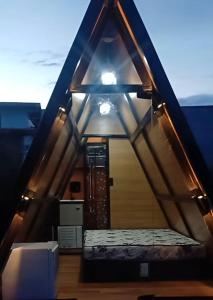 Postel nebo postele na pokoji v ubytování Chalés 1 Chácara Santa Felicidade