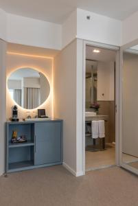 a bathroom with a sink and a mirror at Blue Tree Premium Paulista in São Paulo +96 photos