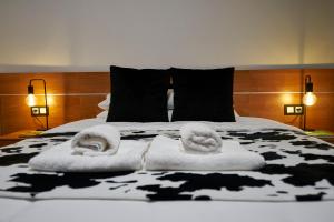 Ένα ή περισσότερα κρεβάτια σε δωμάτιο στο Bicis & Vacas