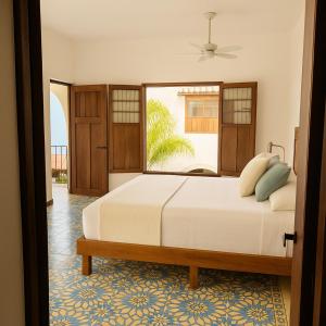 Ένα ή περισσότερα κρεβάτια σε δωμάτιο στο DezMont Guest House