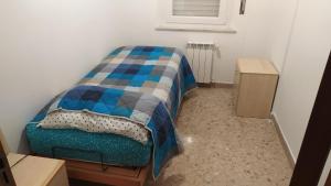 Postel nebo postele na pokoji v ubytování Amelia Sweet Home - Farindola