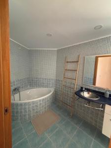 a bathroom being remodeled with a tub and a mirror at Ria Seahouse Cabanas de Tavira in Tavira +107 photos