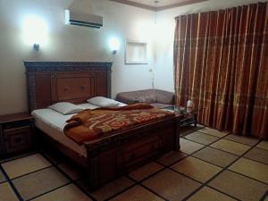 Ένα ή περισσότερα κρεβάτια σε δωμάτιο στο New moon soon hotel