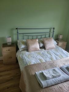 Ένα ή περισσότερα κρεβάτια σε δωμάτιο στο Ard A Mhaoire +4 φωτογραφίες