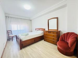 Ένα ή περισσότερα κρεβάτια σε δωμάτιο στο Atlentic Horizon Apartment