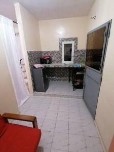 Η κουζίνα ή μικρή κουζίνα στο Résidence hibis chez M&B