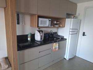 Køkken eller tekøkken på Apartamento, Studio, Loft - GO Rio Branco, próximo HCPA e HPS