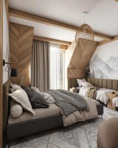 a bedroom with two beds and a large window at Pokoje Gościnne u Moniki Zakopane in Zakopane
