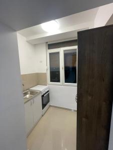 Kuchyň nebo kuchyňský kout v ubytování Apartament o camera Cantemir Oradea
