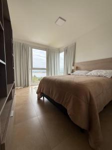 Ένα ή περισσότερα κρεβάτια σε δωμάτιο στο Depto Fragata