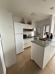 Η κουζίνα ή μικρή κουζίνα στο Depto Fragata