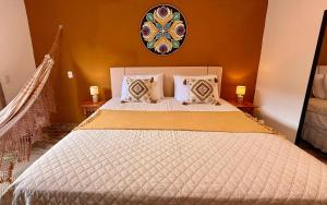 Ένα ή περισσότερα κρεβάτια σε δωμάτιο στο Mandala Suites