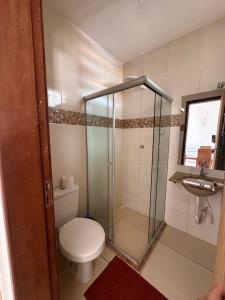 Ένα μπάνιο στο Village Villa Sossego