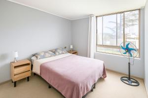 Кровать или кровати в номере Alojamiento moderno y bien conectado a pasos del Metro y centros urbanos +27 фотографий