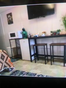 Η κουζίνα ή μικρή κουζίνα στο Geraldton Rooms