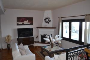 Posezení v ubytování Villa Erifili