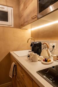 Η κουζίνα ή μικρή κουζίνα στο Cenote Suite - Expérience sensorielle +15 φωτογραφίες