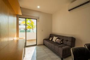 Posezení v ubytování Apartment for 4 with wave pool