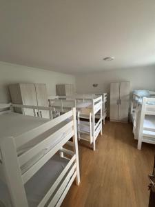 a room filled with lots of bunk beds at Hostel 164 in Beograd