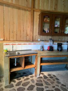 Kuchyň nebo kuchyňský kout v ubytování Hostal Xeabaj La Cascada