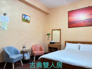 Postel nebo postele na pokoji v ubytování 鹽舍休閒民宿