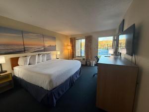 TV a/nebo společenská místnost v ubytování Gateway Inn