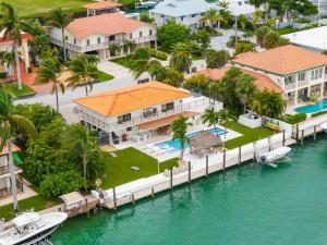 an aerial view of a house on the water at Deep Blue Waterfront Gem Pool Kayaks Dock in Key Colony Beach