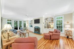 a living room filled with furniture and a fireplace at MH3012: 3012 Marsh Haven in Seabrook Island