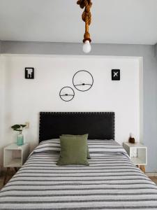 Postel nebo postele na pokoji v ubytování Altos de Barrio Sur