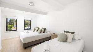 Postel nebo postele na pokoji v ubytování La Luce - Port Stephens