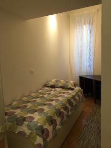 Postel nebo postele na pokoji v ubytování Daniela