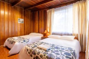 Ένα ή περισσότερα κρεβάτια σε δωμάτιο στο Hotel Holístico Monteverde