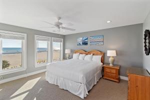 Ένα ή περισσότερα κρεβάτια σε δωμάτιο στο GP132: 132 Grand Pavilion +24 φωτογραφίες