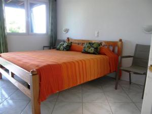 Posteľ alebo postele v izbe v ubytovaní Tamarind Tree Hotel