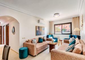 Posezení v ubytování Appartement Moderne & Spacieux au Cœur de Guéliz et Proche Majorelle