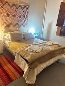 Ένα ή περισσότερα κρεβάτια σε δωμάτιο στο Refugio Caro Cox