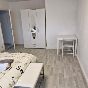 Ένα ή περισσότερα κρεβάτια σε δωμάτιο στο Esquina