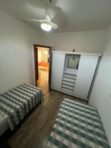 Postel nebo postele na pokoji v ubytování vista mar e por do sol- morro de sao paulo