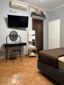 TV a/nebo společenská místnost v ubytování Villa Busiello