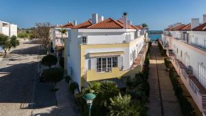 an aerial view of a building in a city at Ria Seahouse Cabanas de Tavira in Tavira