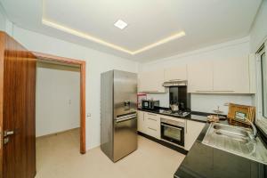 Η κουζίνα ή μικρή κουζίνα στο Rabat Apartment