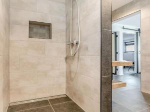eine Dusche mit Glastür im Badezimmer in der Unterkunft Luxury farmhouse in Baarle-nassau in Schaluinen + 12 Fotos