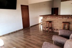 Χώρος καθιστικού στο Cabaña Villa de Leyva - Villa Sofia Ritoque #2