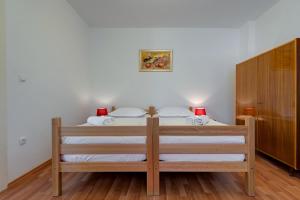 Posteľ alebo postele v izbe v ubytovaní Apartments Odrina